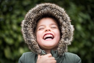 photo of child laughing