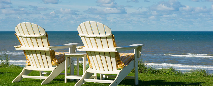 lawn chairs by beach